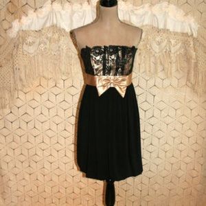 Black and champagne strapless cocktail dress